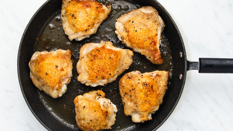 chicken thighs in pan 
