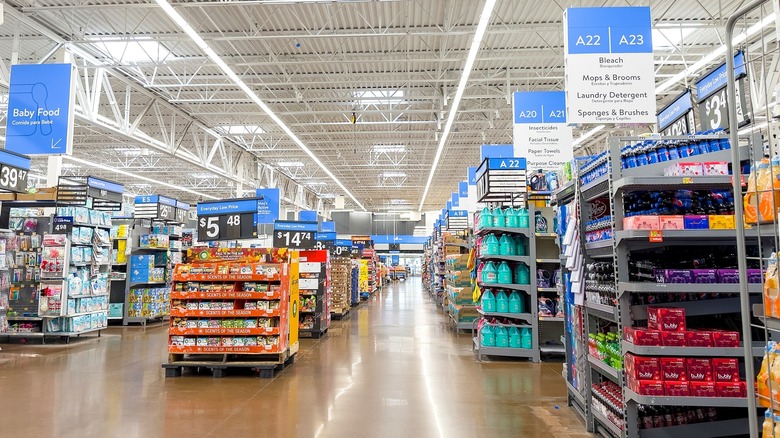 Walmart interior with rows of aisles