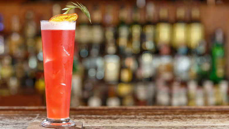Close-up of Singapore sling cocktail posed on bar top