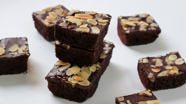 An assortment of fudge squares with nuts.