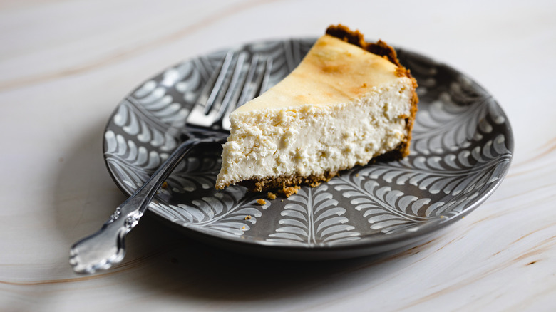 slice of cheesecake with fork