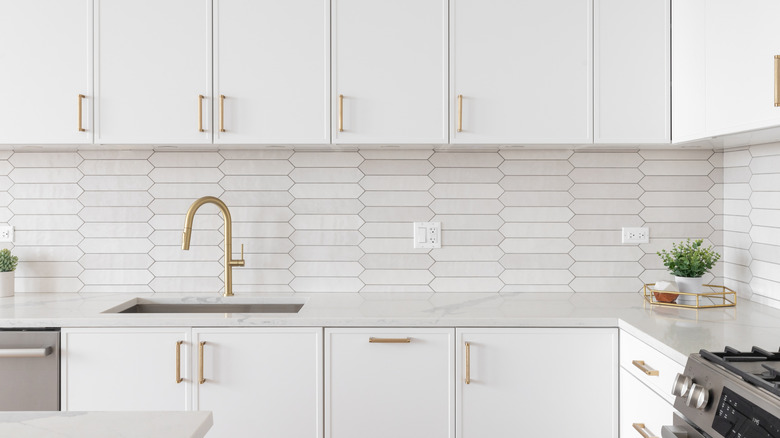 Cabinets above and below a kitchen counter