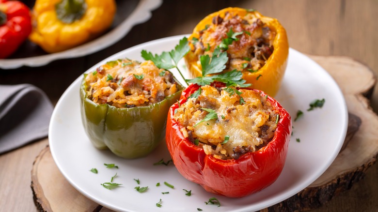 Bakes peppers stuffed with a rice filling and topped with melted cheese
