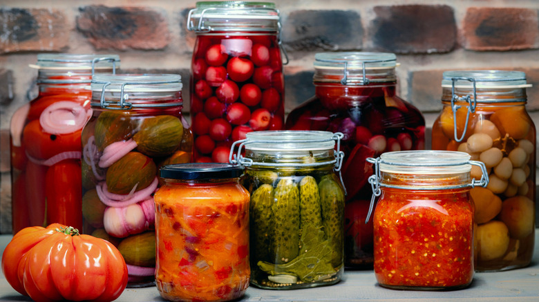 Jars of pickled and preserved fruits and vegetables