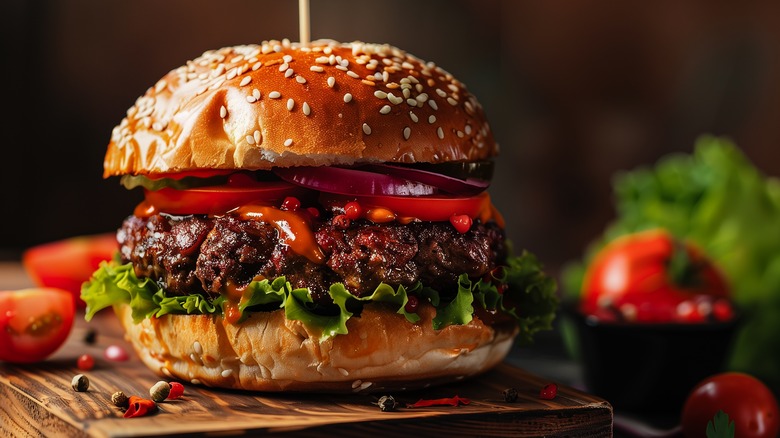 Close-up burger on wooden board