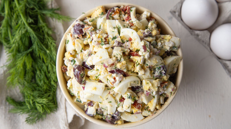 egg salad in a beige bowl