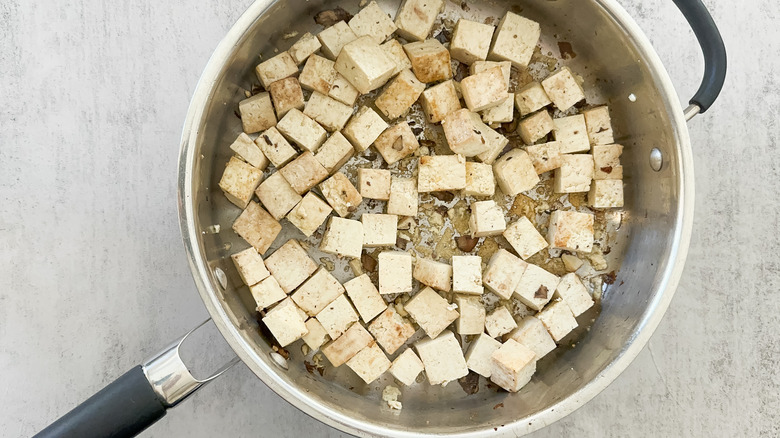 sauteed tofu in skillet